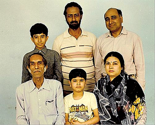 Front: L to R: Master Ashni Kumar Ji (1916-1999), Varoon (Bal Anand’s son), Aradhana (Bal Anand’s wife). Back: Aditya (Bal Anand’s son), Inquilab Singh (Bal Anand’s classmate), Bal Anand. c. 1986