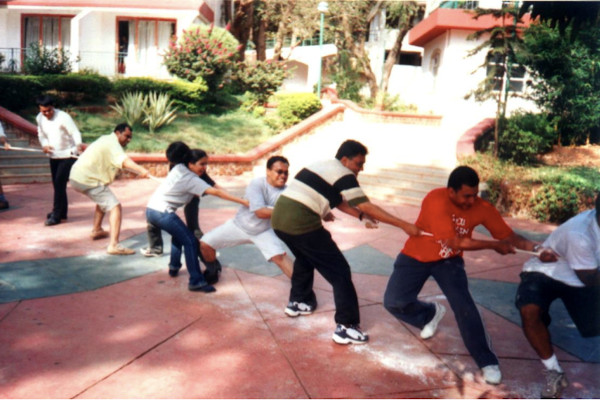 MGMT U graduates play a game of tug-of-war at Matheran.