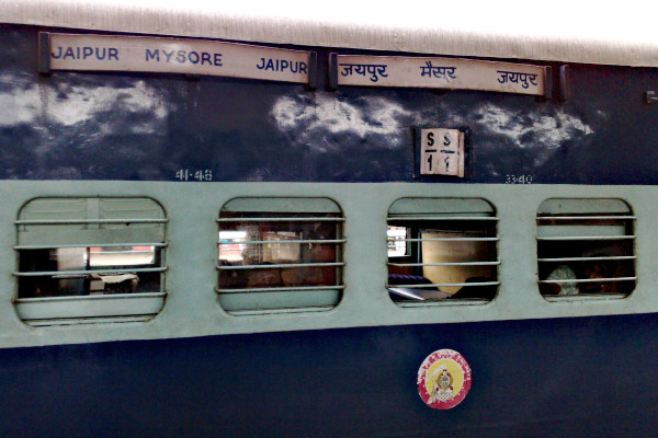 A sleeper coach of the Jaipur - Mysore Express train.