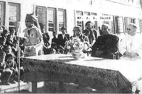 Republic Day celebration. St. Xavier’s School, Jaipur. Probably 1963. Speaker: Dhananjai Birla. Sitting at the table: Guests at the school function; extreme right: Father Willmes. Standing behind: Mr. Athar Ali Sayed, scoutmaster.