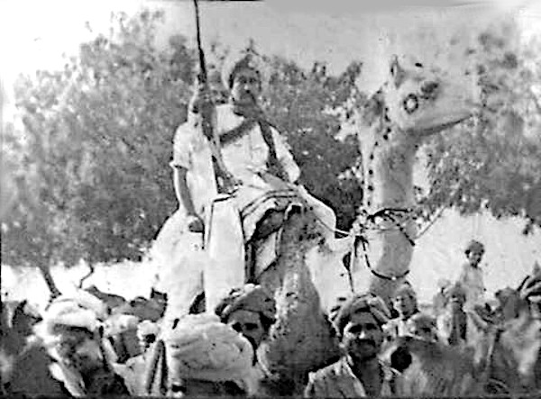 Balwant Singh on a camel at the Sanchore Mela in the 1950s.