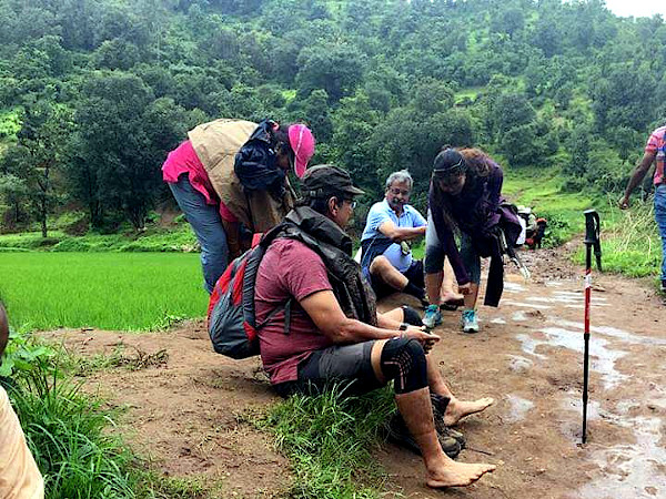 The group has just crossed the water barrier here and everyone is quickly getting ready for the trek into the dense jungle.