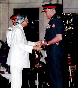 Major General Raj Mehta receiving an award for distinguished service in a war zone from the President on Republic Day.
