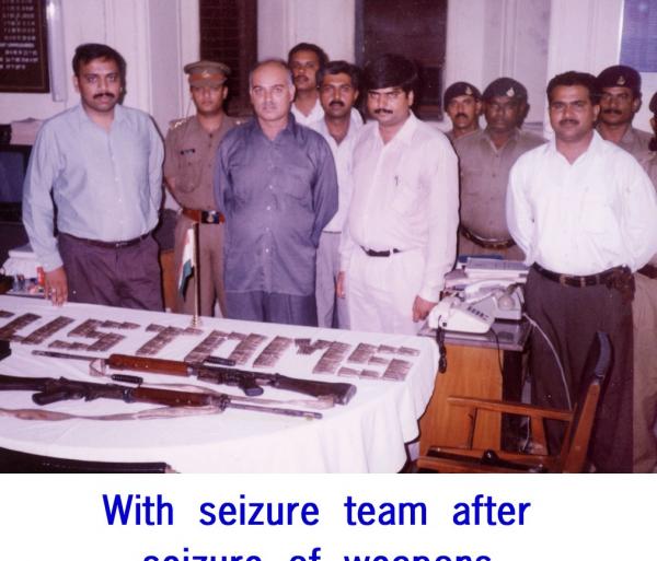 Raju with seized weapons