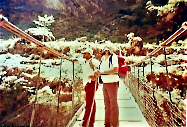 Roger and Rao on a bridge.